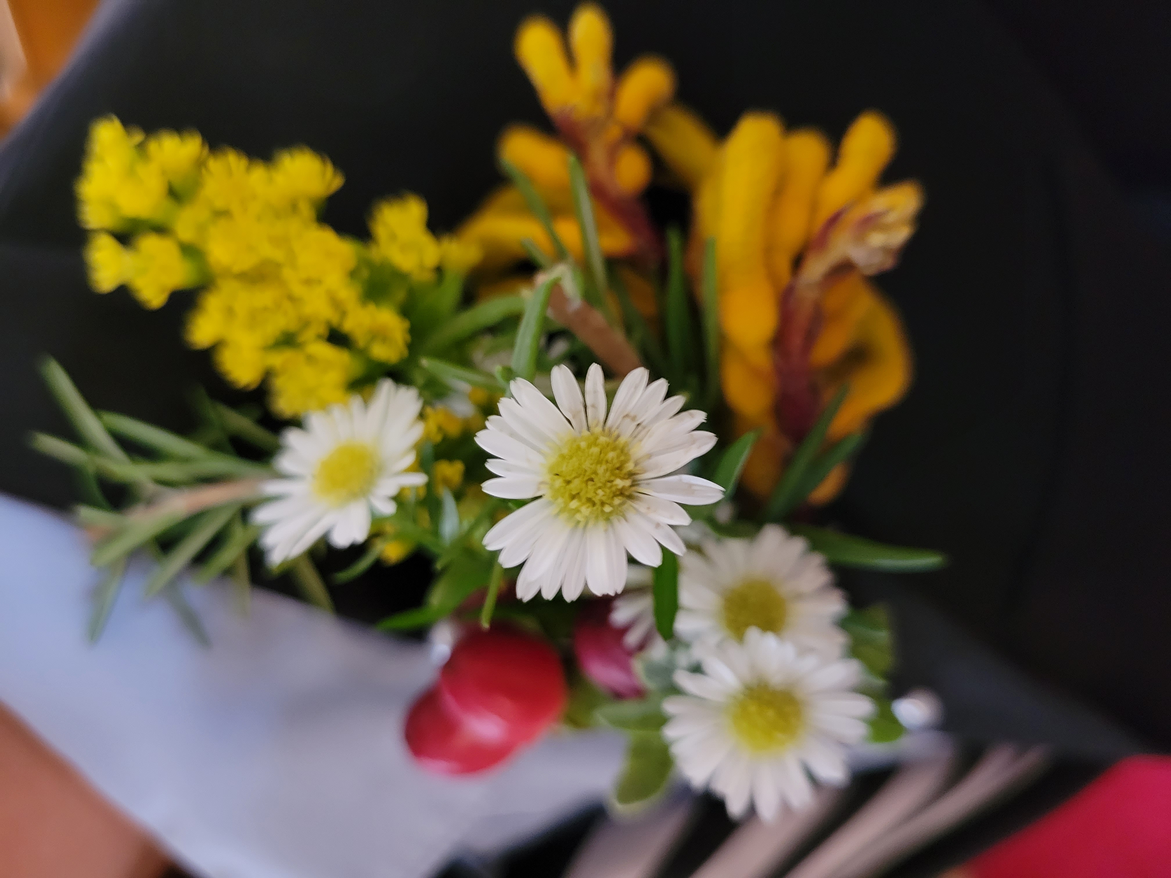 white and yellow boutonniere
